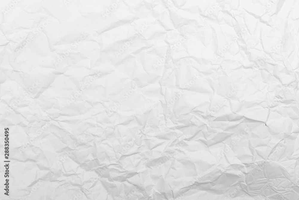 Fototapeta premium White crumpled paper texture background.