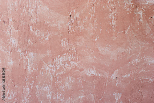 Background and texture painted pink on wall