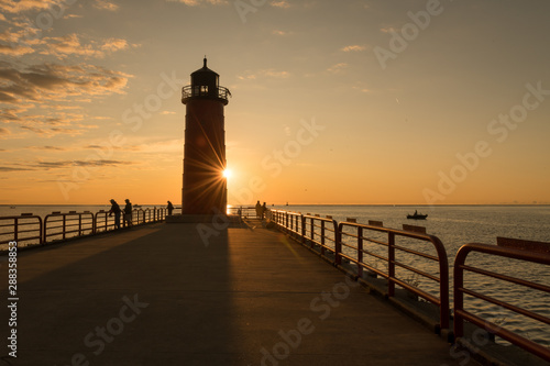 Lighthouse on Lake Michigan at Sunrise in Milwaukee with starburst