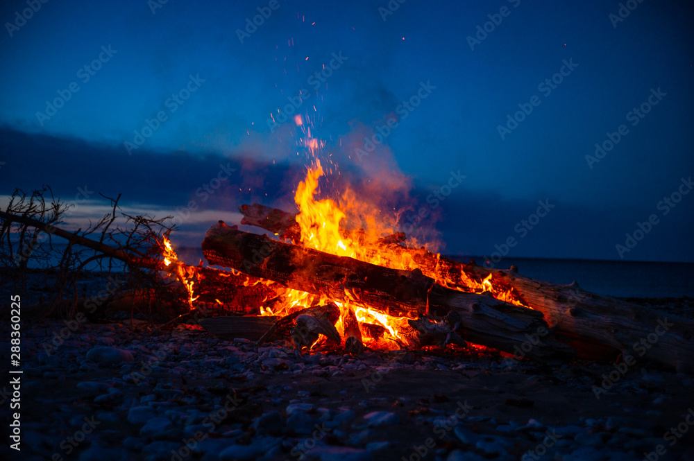 Anticostis - Canada. Sunset, Campfire in Camping Area Anticostis - Canada. Sunset, Campfire in Camping Area