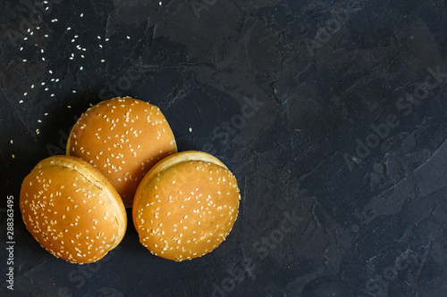 burger bun (wheat sesame seed bun) menu concept. food background. copy save. Top view