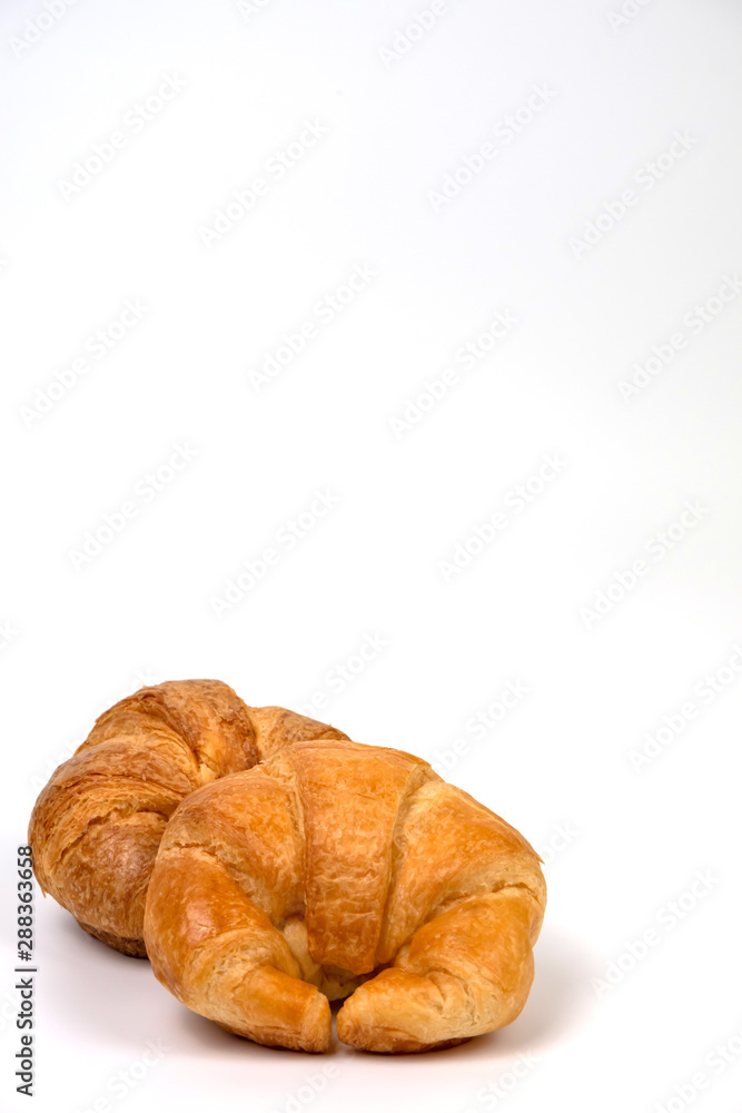 Tasty croissant on white background.