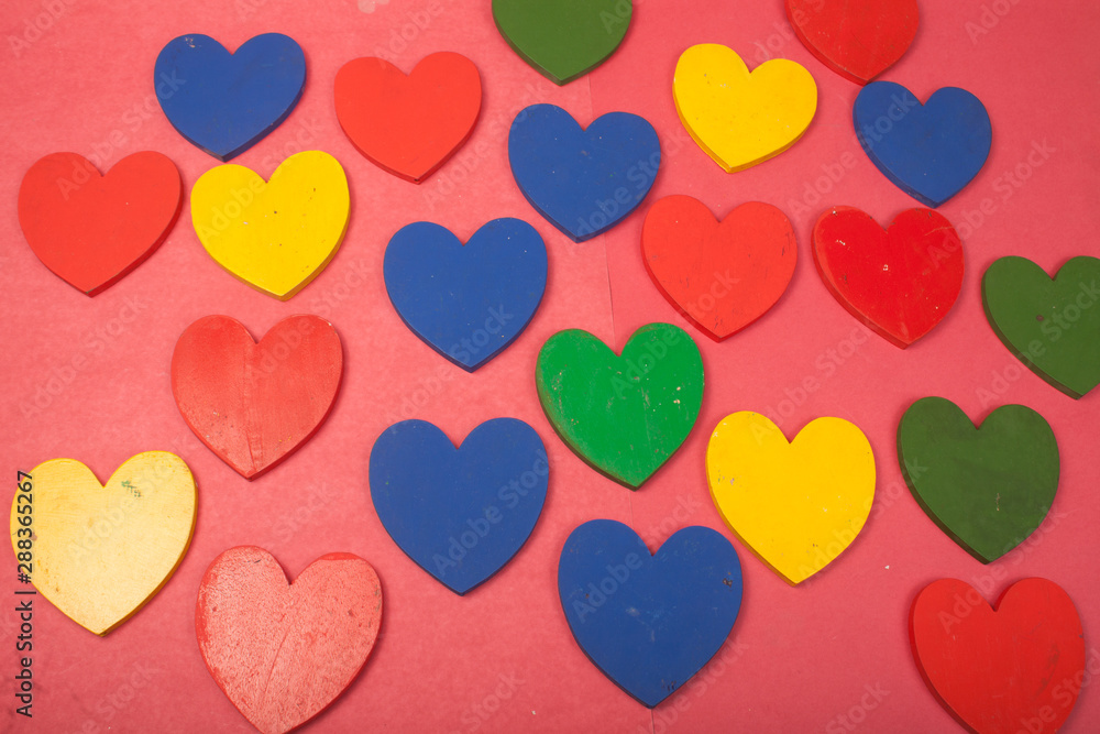 love colorful hearts on a red background love colorful hearts on a red background