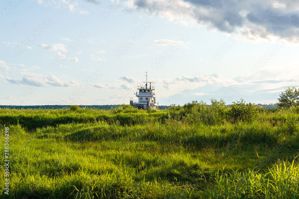tugboat in the grass sea tugboat in the grass sea