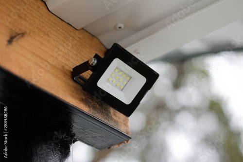 Black led floodlight in off state. Close up