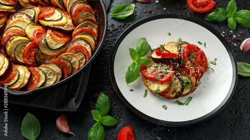 Ratatouille Vegetable Stew with zucchini, eggplants, tomatoes, garlic, onion and basil. Traditional French food. photo