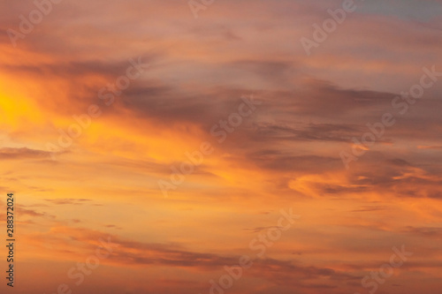 Colorful dramatic sky at sunset with pasted clouds © Volodya