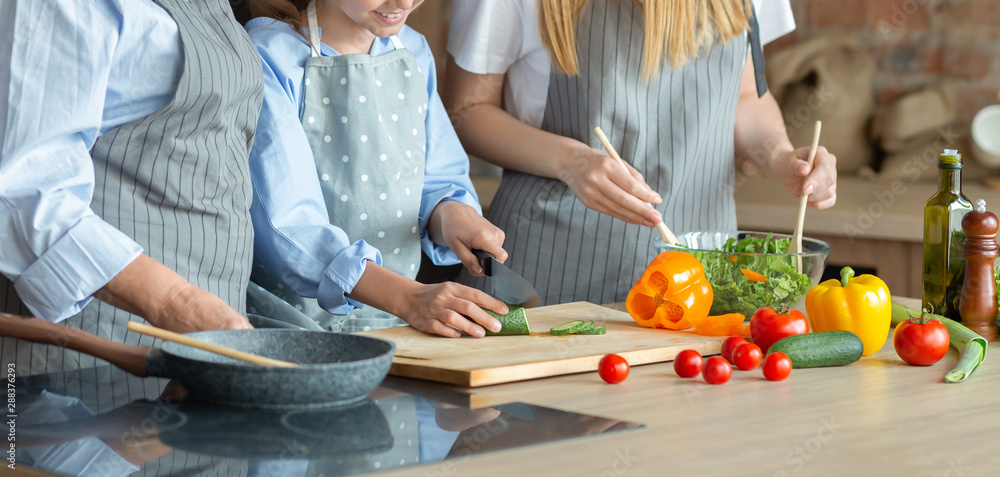 Cropped photo of three women making healthy salad