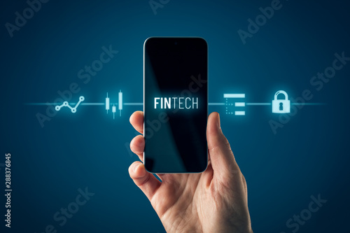Fintech and financial technology on smart phone photo