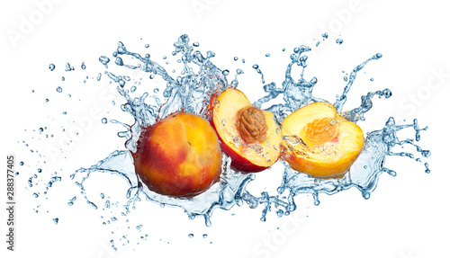 Fototapeta Naklejka Na Ścianę i Meble -  Peach in spray of water.