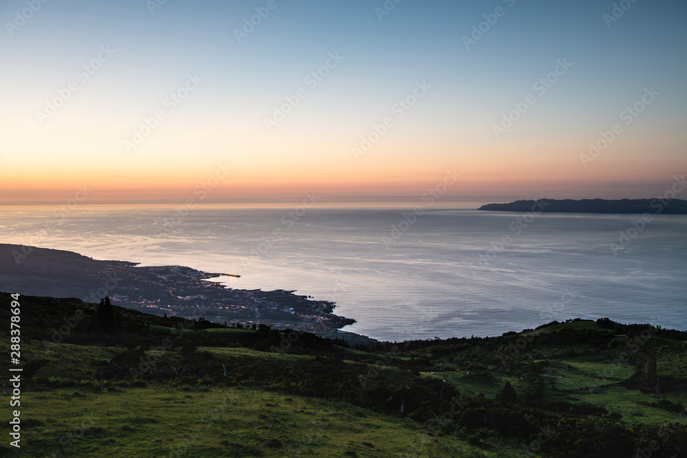 view on the Pico-Sao Jorge channel and Sao Roque after sunset as seen from the central plateau on Pico Island