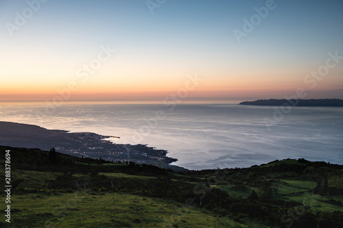 view on the Pico-Sao Jorge channel and Sao Roque after sunset as seen from the central plateau on Pico Island