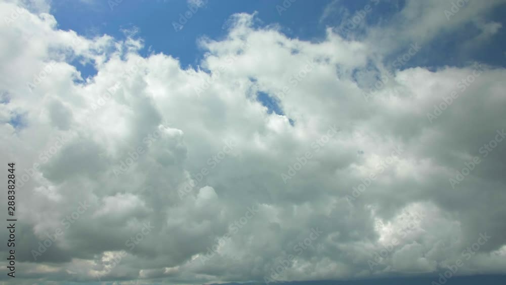Beautiful blue sky with lots of clouds being moved by the wind. Beautiful blue sky with lots of clouds being moved by the wind.