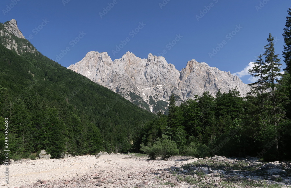 closure of the Krnica valley with the top of the Križ mountain in the Julian Alps in Slovenia closure of the Krnica valley with the top of the Križ mountain in the Julian Alps in Slovenia
