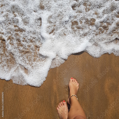 feet on the beach