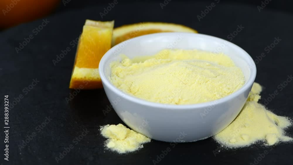 Portion of Orange powder (rotating, seamless loopable; 4K) Portion of Orange powder (rotating, seamless loopable; 4K)