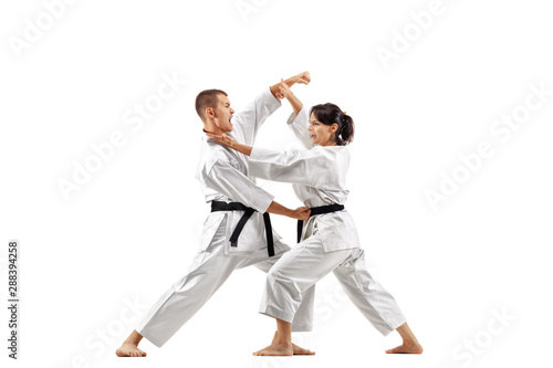 karate girl and boy fighting