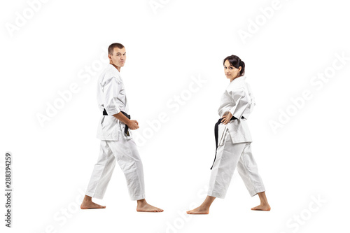 karate girl and boy posing