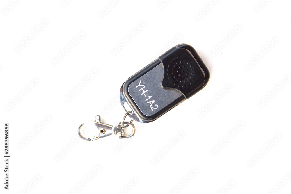 Automatic door remote with keychain isolated on a white background Automatic door remote with keychain isolated on a white background