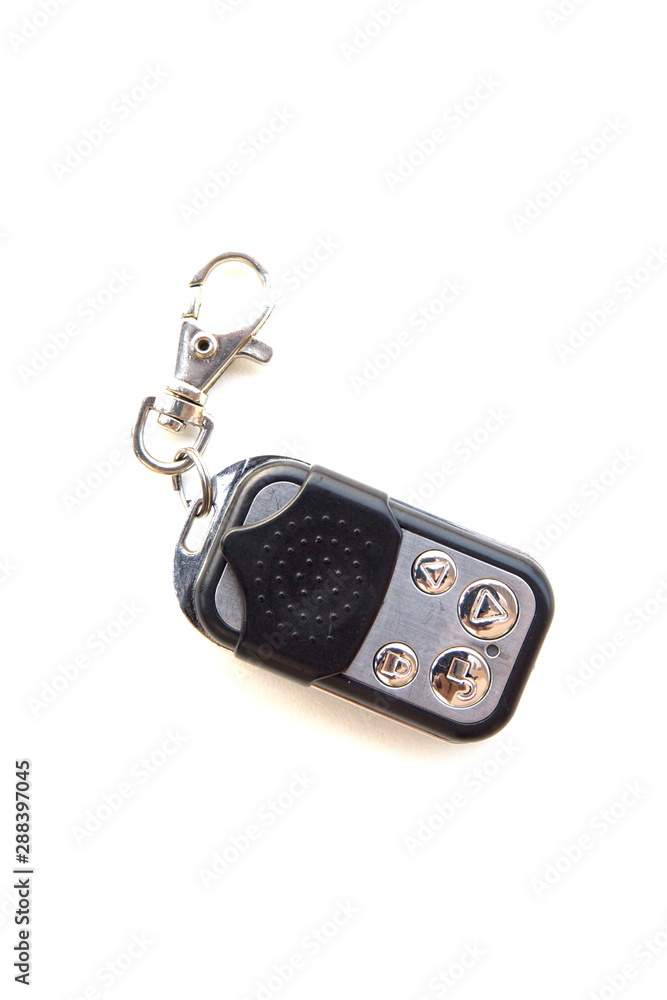 Automatic door remote with keychain isolated on a white background Automatic door remote with keychain isolated on a white background