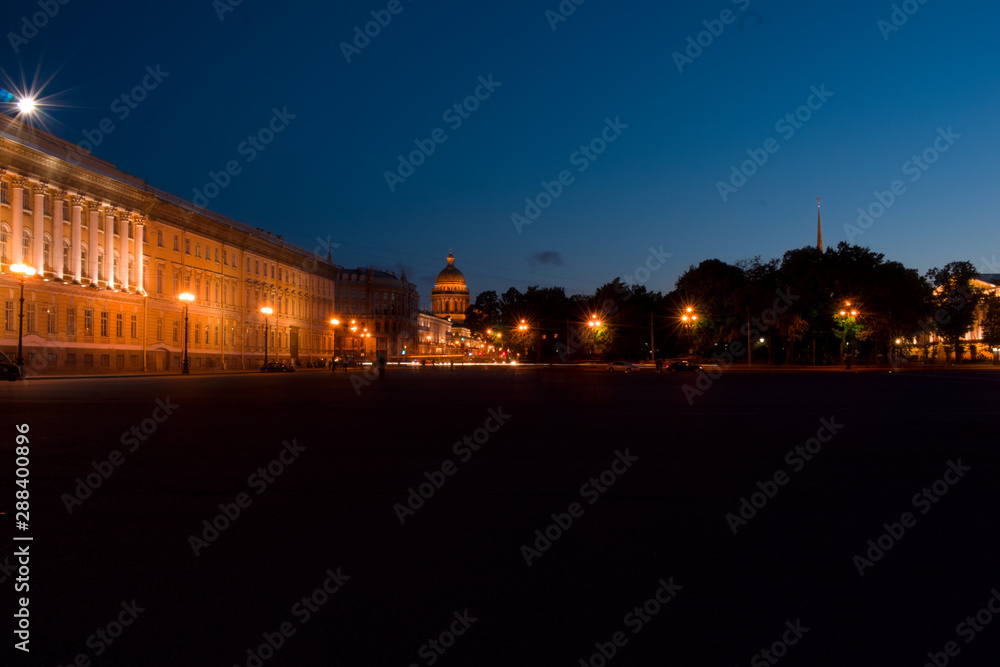 Night view from the corner of Palace Square with a view of St. Isaac's Cathedral in St. Petersburg.