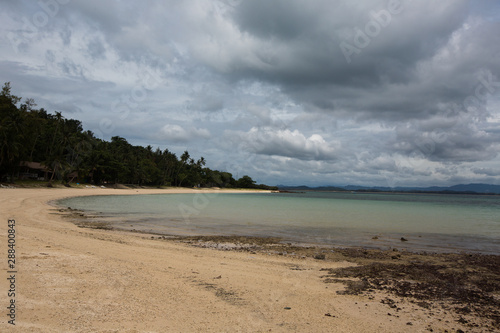 Fototapeta Naklejka Na Ścianę i Meble -  The shore of  Koh Talu Island Thailand on a cloudy day
