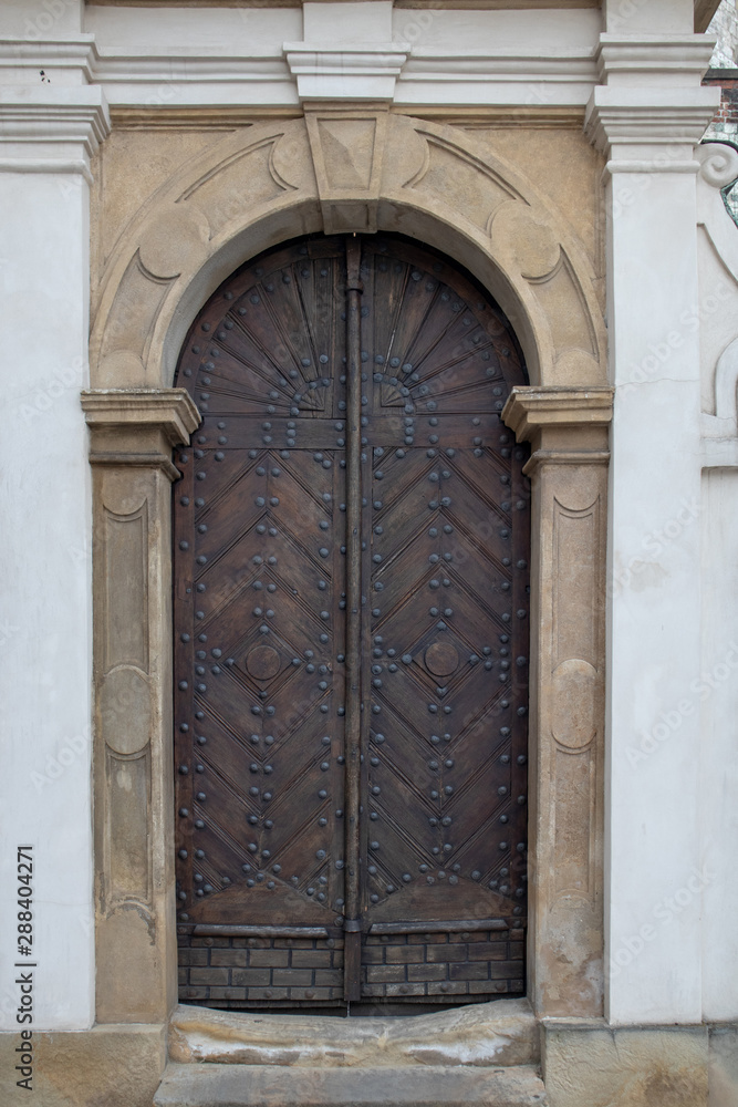 Old powerful wooden fortress doors Old powerful wooden fortress doors