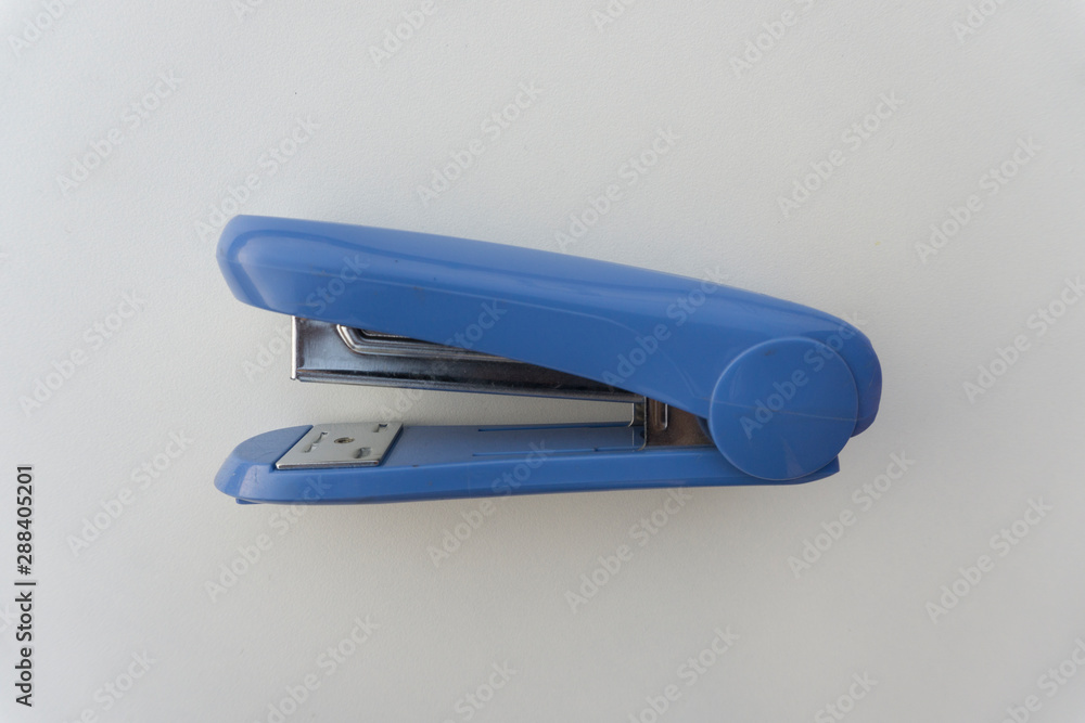 Blue stapler isolated on white background. Blue stapler isolated on white background.