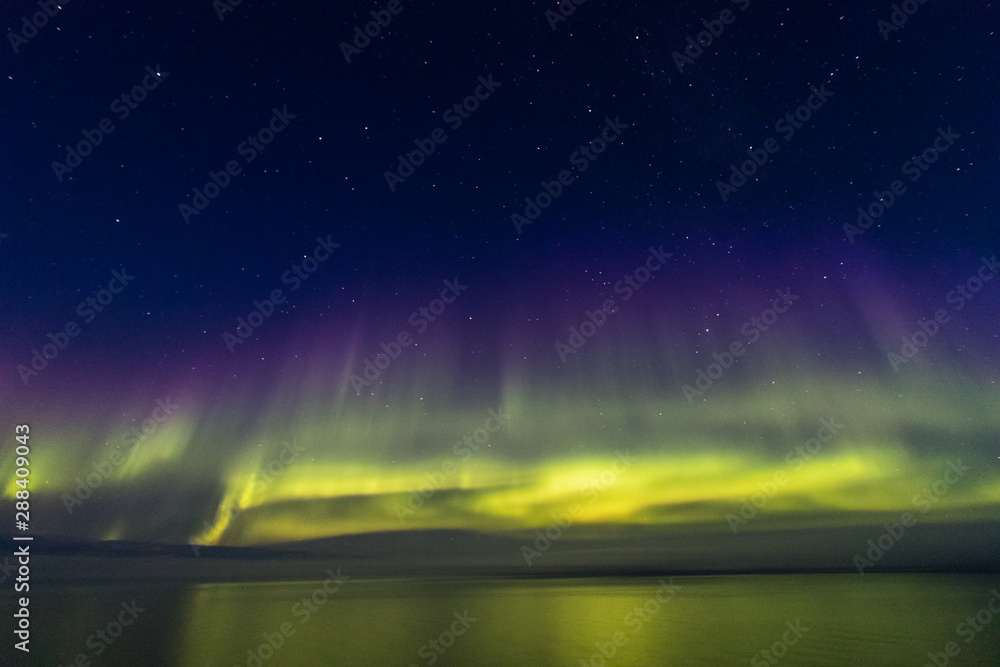 Northern Boreal Lights at sea in Lady Richardson Bay, Victoria Island,  northwest passage in Canada.