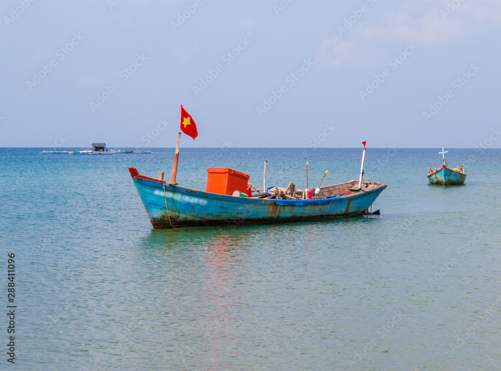 Traditional Vietnamese fisherman boat on Truong Beach (Vietnamese: Bai Truong)