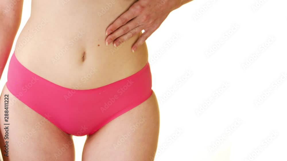 Woman with pink underwear has Menstruation Pain. Woman Body Feeling Abdominal Pain. Straight Shot Woman with pink underwear has Menstruation Pain. Woman Body Feeling Abdominal Pain. Straight Shot