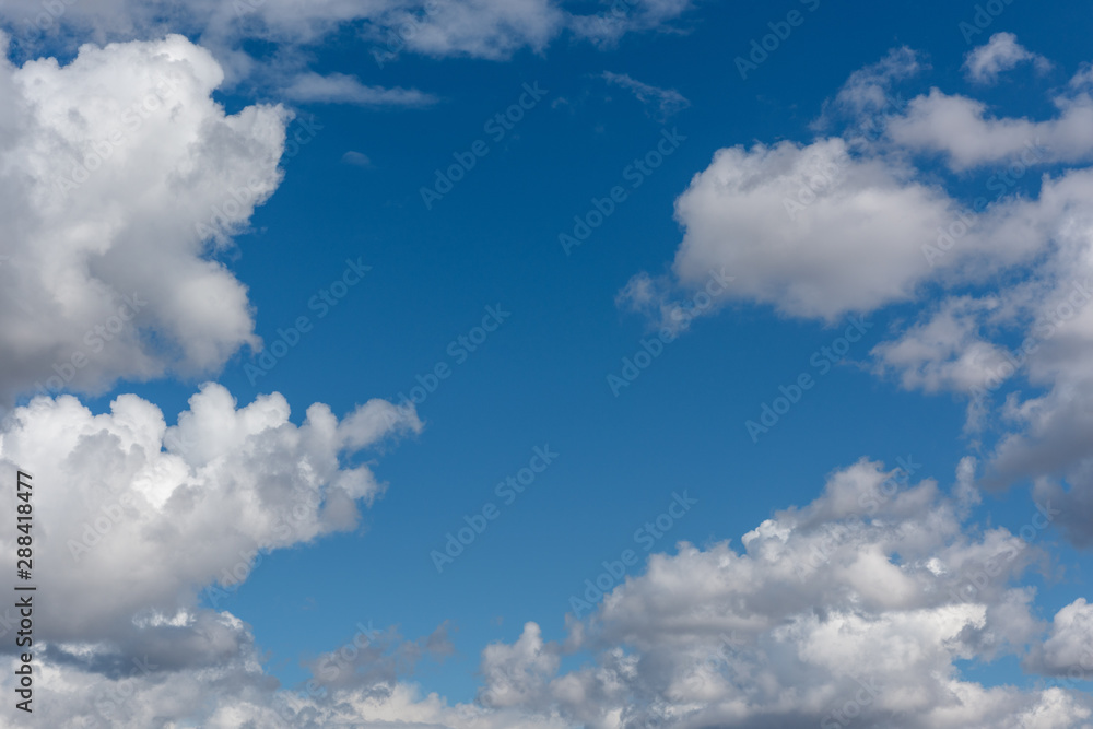Blue sky with white clouds. Sky is in the clouds. Blue sky with white clouds. Sky is in the clouds.