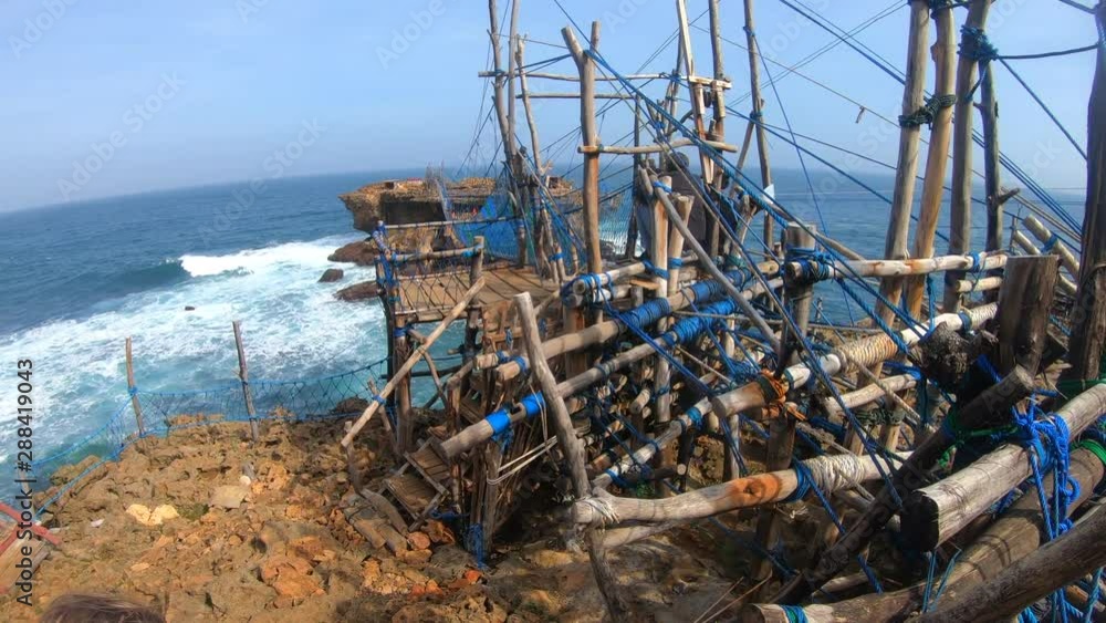 Pantau Timang Suspension bridge on Timang beach, Java island, Indonesia Pantau Timang Suspension bridge on Timang beach, Java island, Indonesia