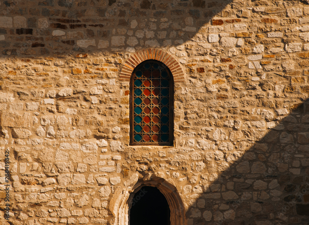 Beutiful ornameted window of medieval castle facade
