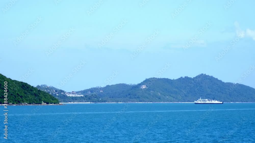 Beautiful view of vast ocean with ship (cruise) on the water. Surrounding view with nature and shoreline. Beautiful view of vast ocean with ship (cruise) on the water. Surrounding view with nature and shoreline.