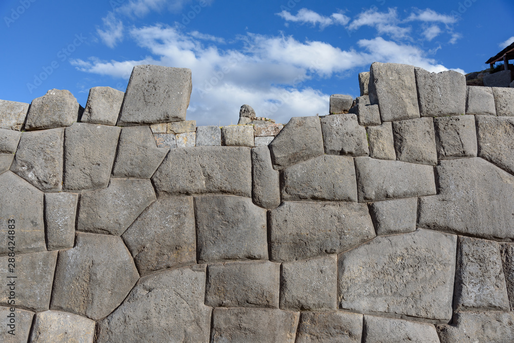 Sacsayhuaman, large fortress and temple complex by the Inca culture in the hills above Cusco, Peru, South America. Sacsayhuaman, large fortress and temple complex by the Inca culture in the hills above Cusco, Peru, South America.