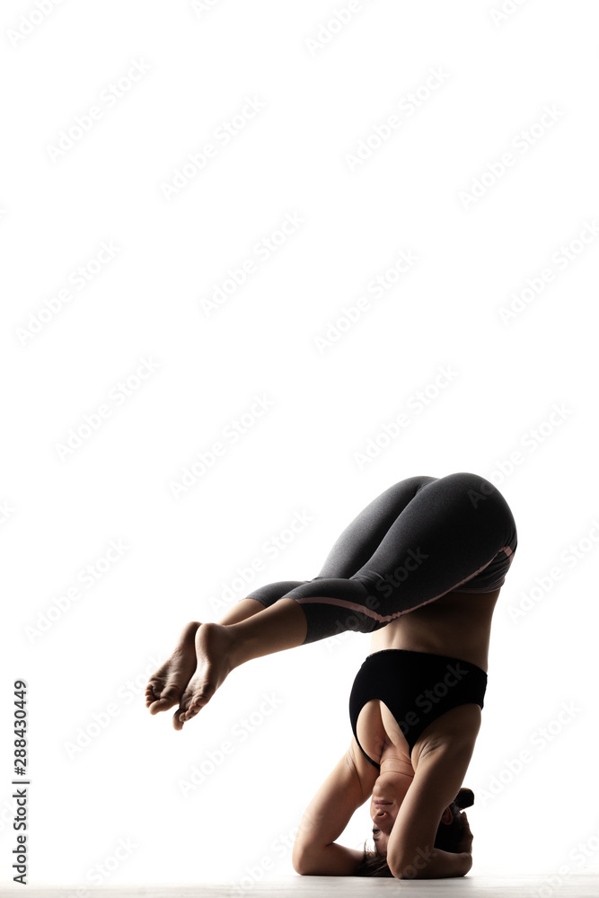 half silhouette female body posing on hands half silhouette female body posing on hands