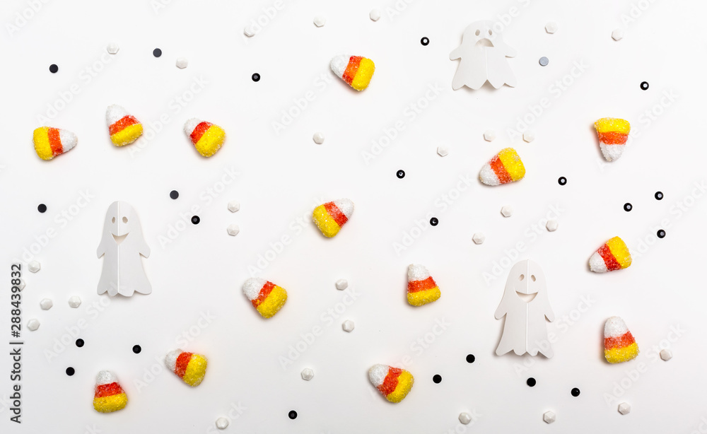 Fototapeta Halloween theme with paper craft decorations on a white background
