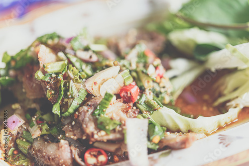 Spicy sliced grilled beef salad at Thai food