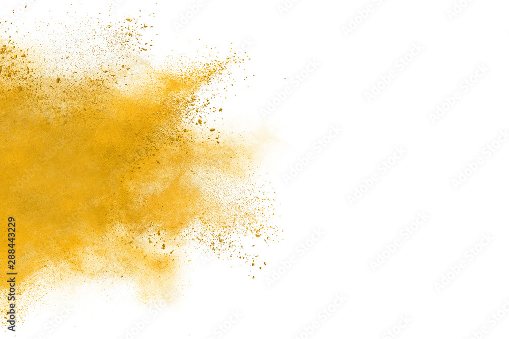 Yellow powder explosion on white background. Colored cloud. Colorful dust explode. Paint Holi.
