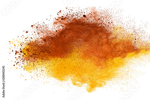 Yellow powder explosion on white background. Colored cloud. Colorful dust explode. Paint Holi. © piyaphong
