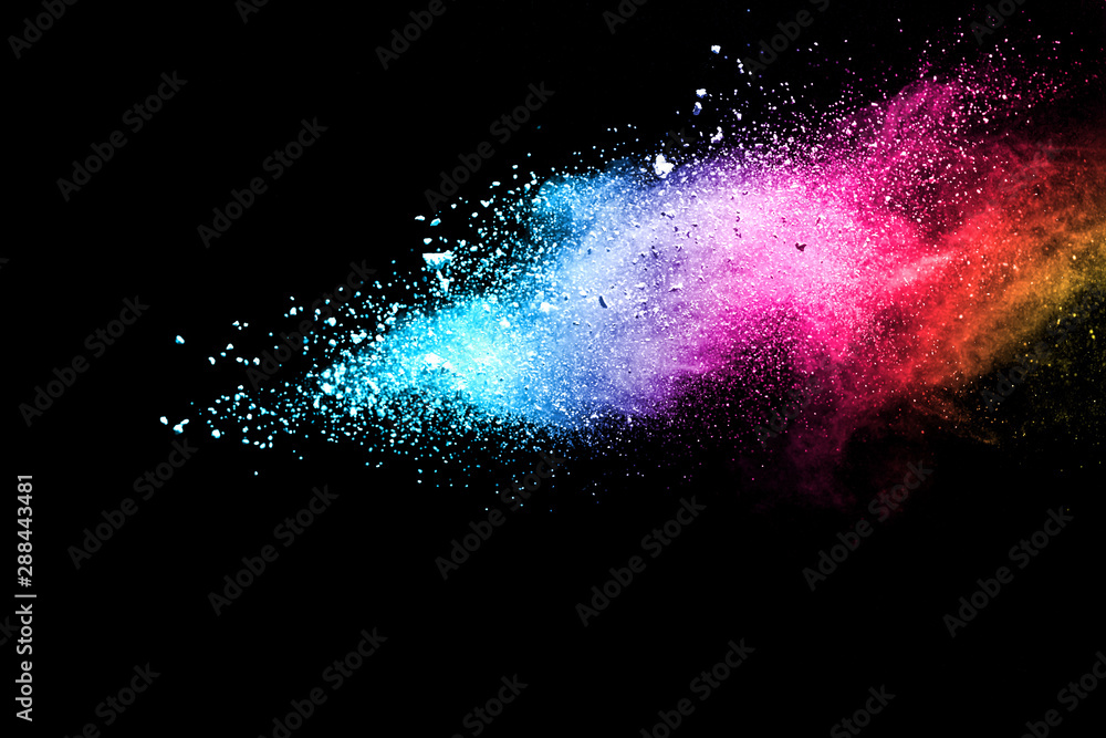 Fototapeta Explosion of colored powder isolated on black background. Abstract colored background. holi festival.