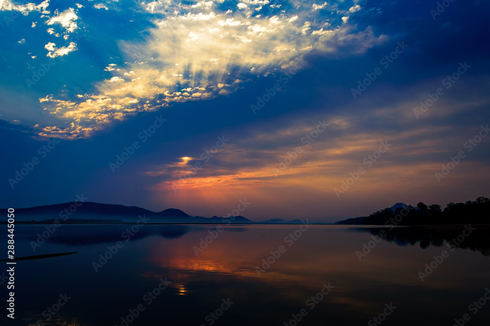 Sunrise over Mahanadi river, Odisha, Eastern Ghat mountain range, copy space