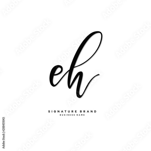 E H EH Initial letter handwriting and signature logo concept design.