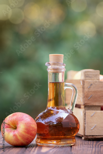 apple vinegar in glass pitcher