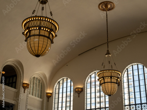 Onate chandeliers hanging during daytime in large building