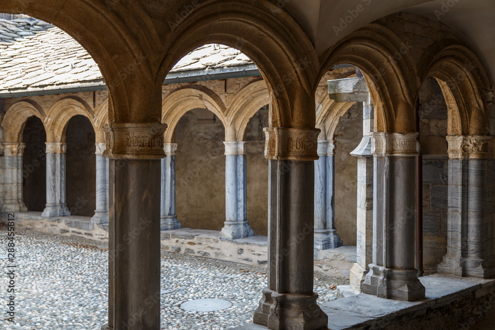 AOSTA / ITALY - JULY 2015: Cloister of a church in the historic centre of Aosta town, Italy