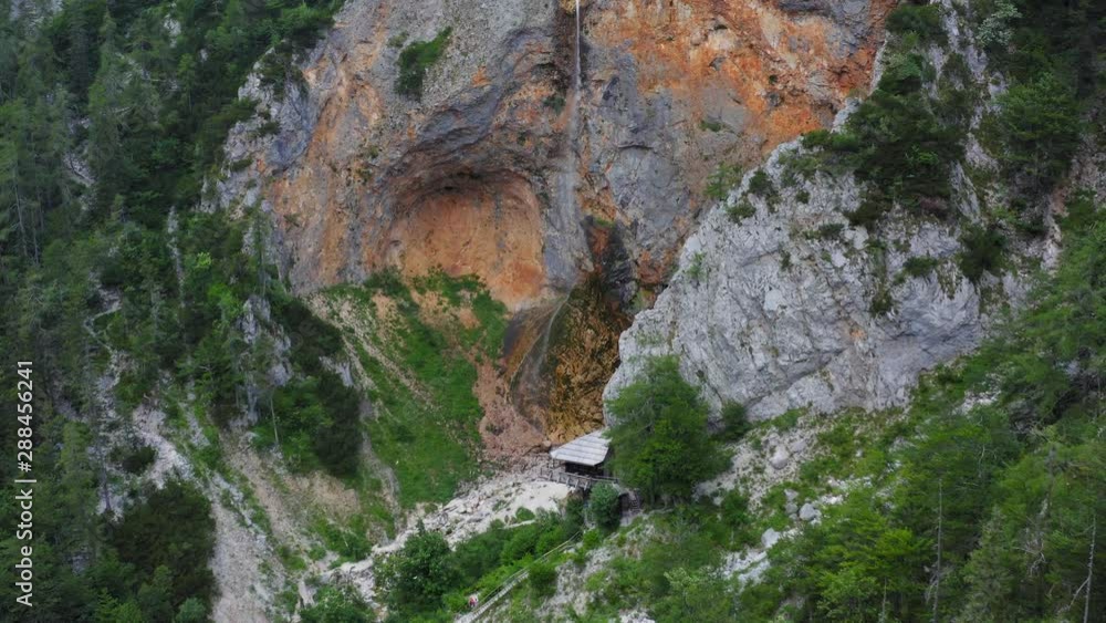 Drone shot of a Rinka waterfall in Slovenia fly over viewing platform Drone shot of a Rinka waterfall in Slovenia fly over viewing platform