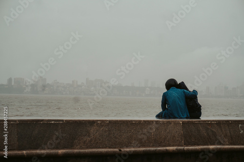 couple hanging in marine marine lines in monsoon season