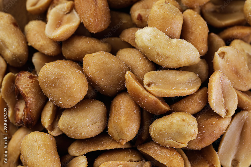 the peanuts texture. Nuts. salted peanuts background. the peanuts texture. Nuts. salted peanuts background.